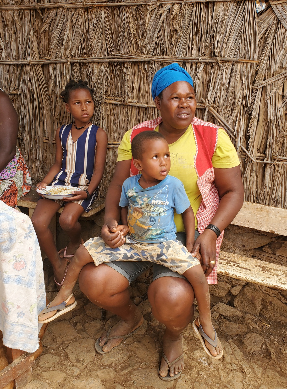 Villagers, children, and a mother in the rebel village of Los Rabelados, Cape Verde, on Santiago Island