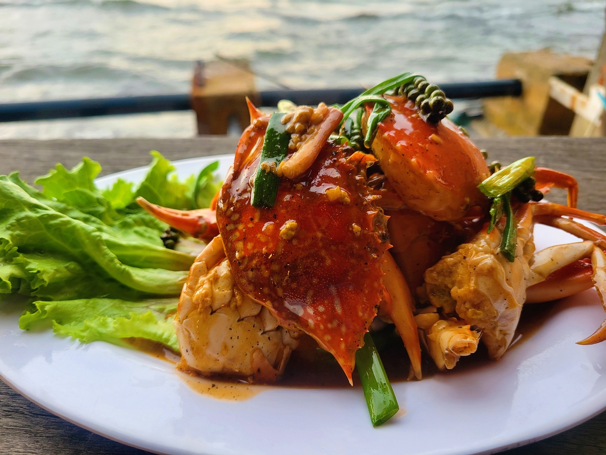 Blue crab dish with fresh Kampot green pepper and sauce, a Cambodian specialty