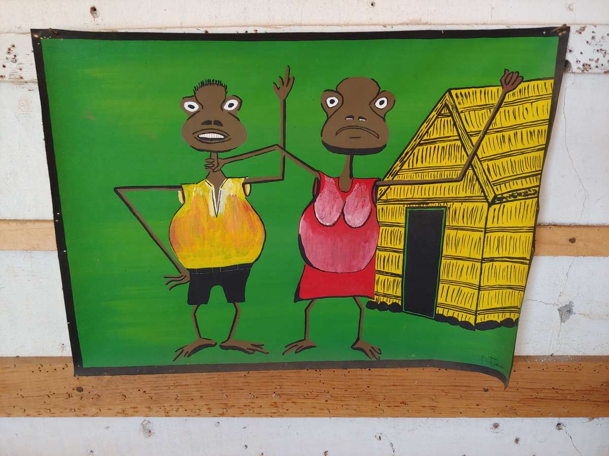 Artistic painting in the rebel village of Los Rabelados: a woman holding a man by the neck