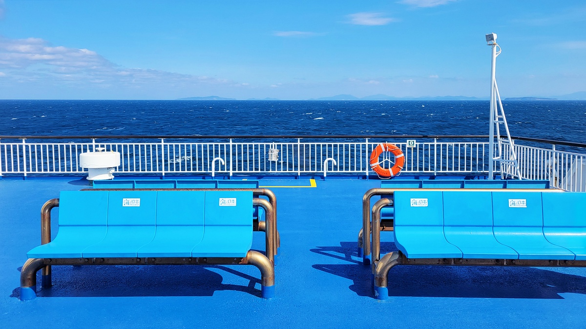 Bench on the outdoor deck of the Camellia Line ferry with a view between Japan and Korea